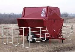 Red 155 bushel commercial creep feeder with white panels, on wheels