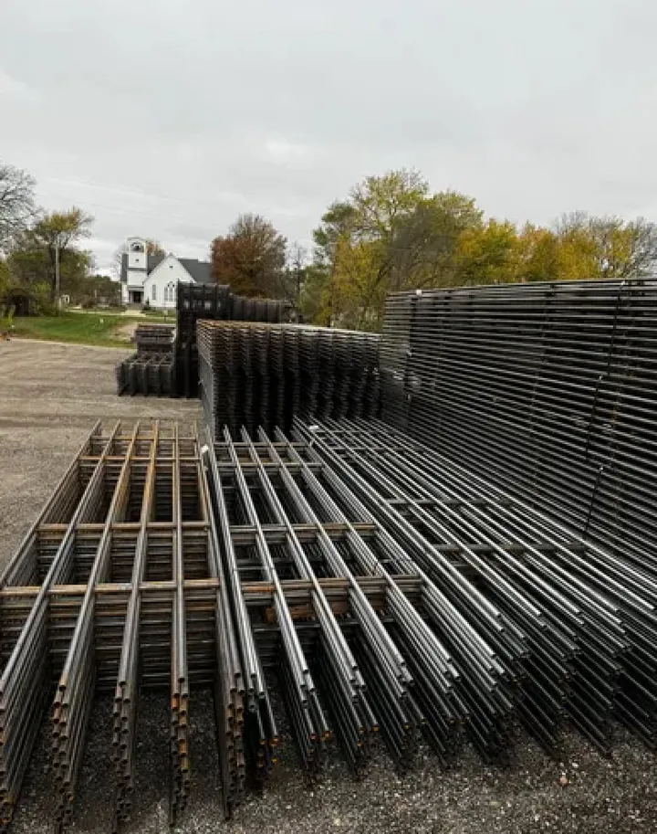 Stack of continuous fence panels, 20 feet long and 4 feet tall