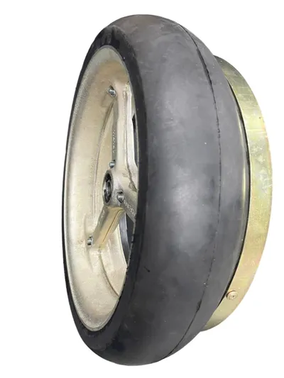 Norseman scraper ring fitted to a planter gauge wheel