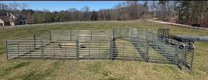 Alsobrook system pens set up across a pasture, wide view