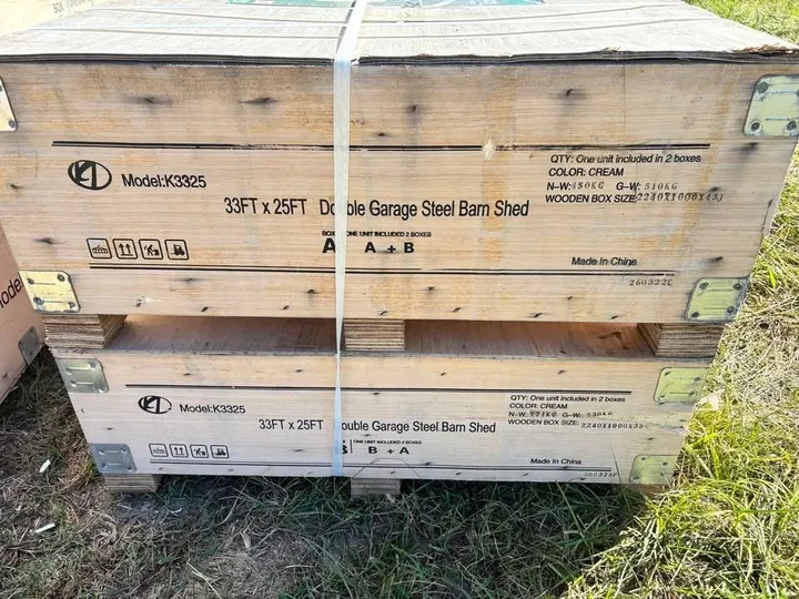 Crated 33 ft by 25 ft double garage steel barn shed kit