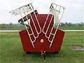 145 bushel creep feeder with the lid open, front view