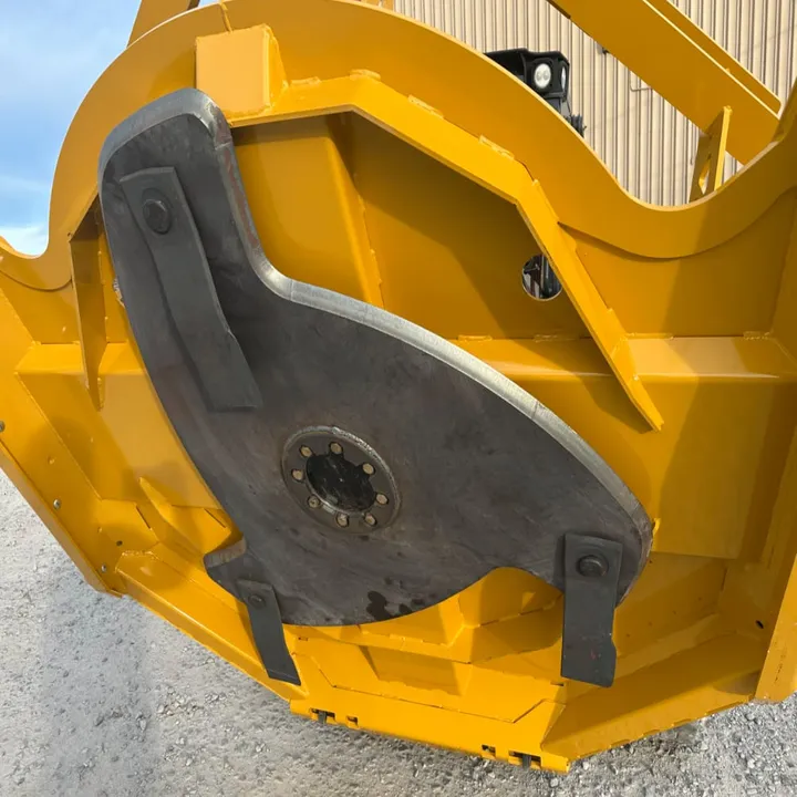 Close-up of the brush cutter blade carrier under the deck