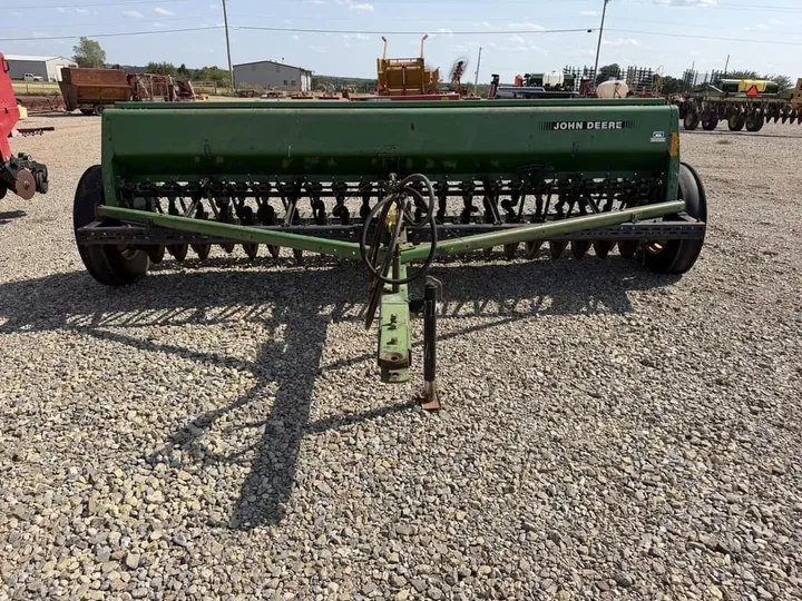 Used 1993 John Deere 450, photo 3 of 6