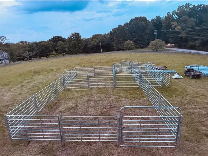 Caperton system holding pens with a walk-through gate