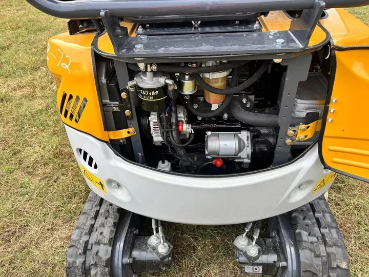 ME20 mini excavator engine bay with the rear cover open